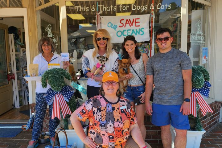 a group of people standing in front of a building