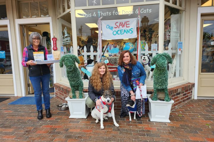 a group of people standing in front of a building