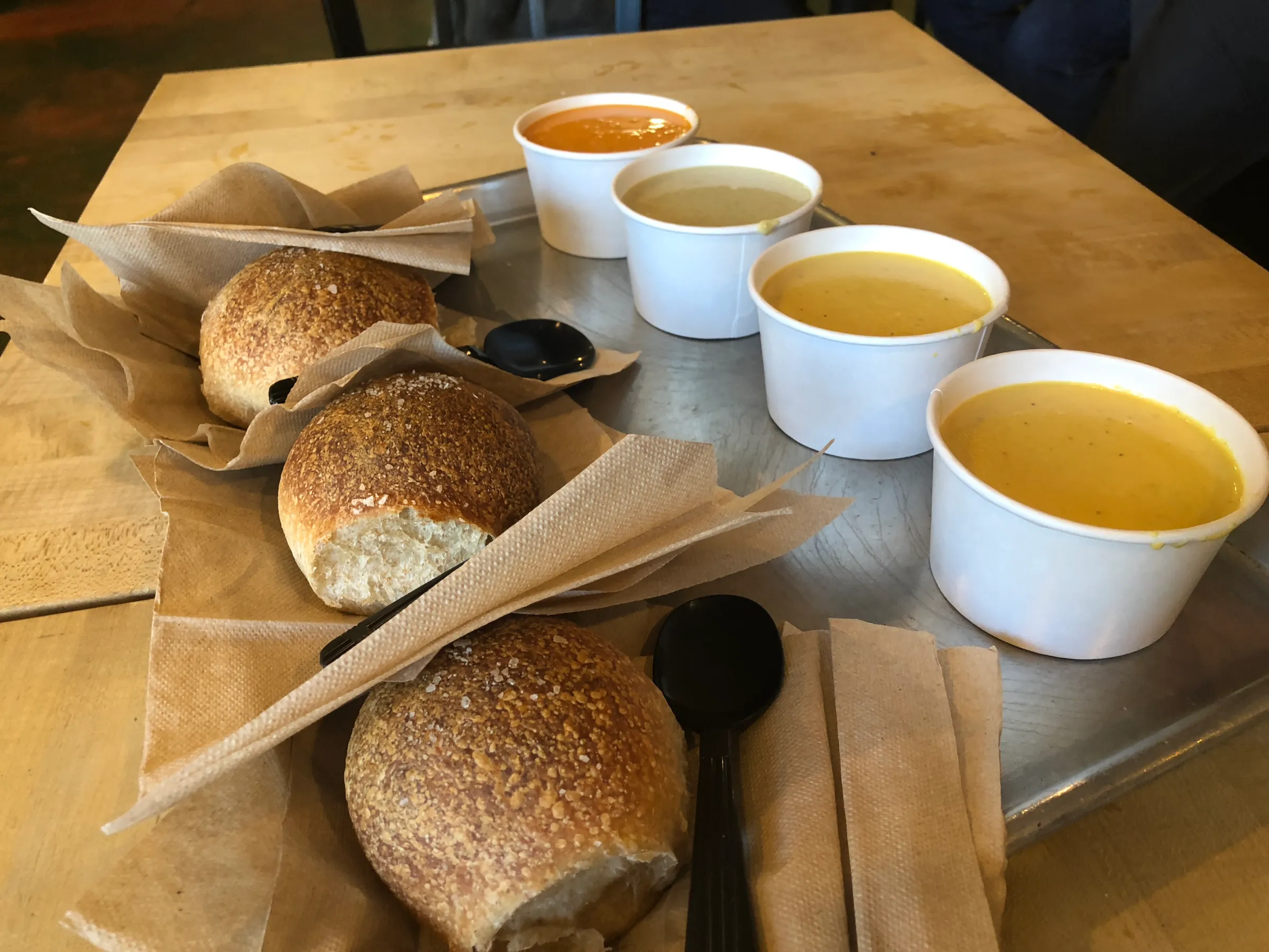 a breakfast sandwich and a cup of coffee