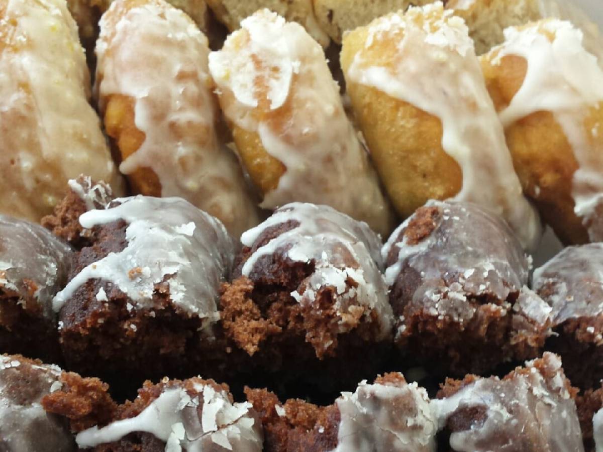 a close up of a box of donuts