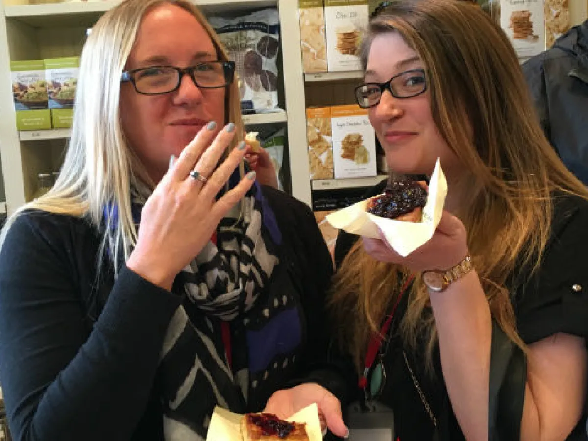 a woman eating food at a restaurant