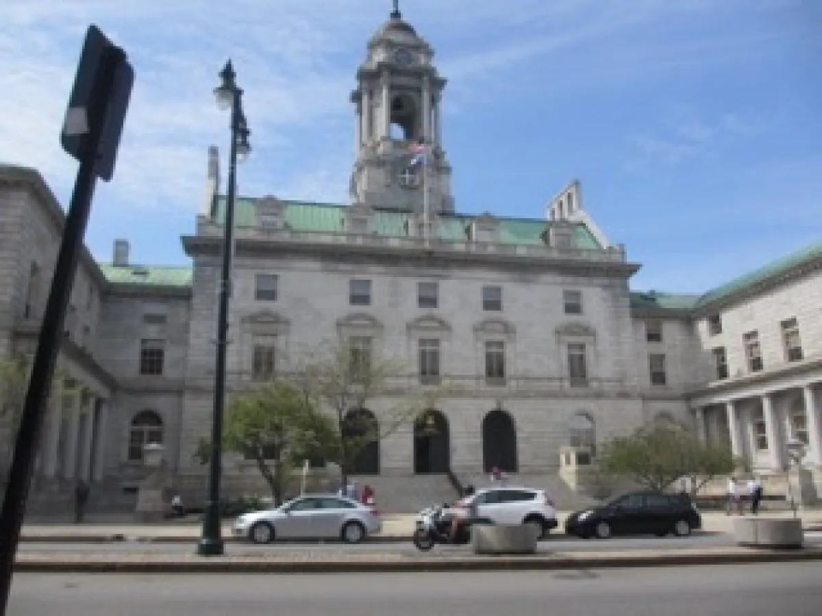 a close up of a street in front of a building