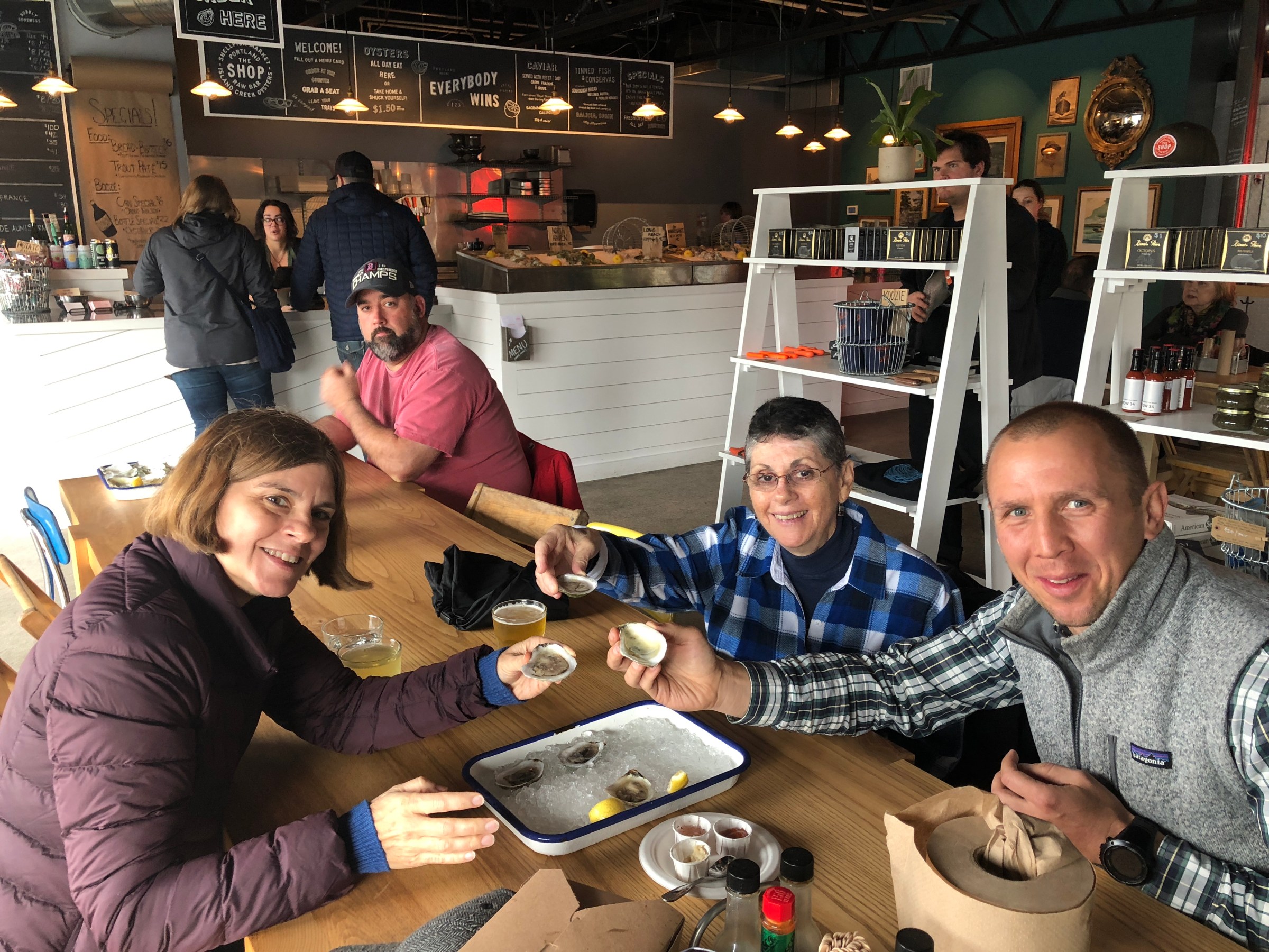 a tour group eating oysters