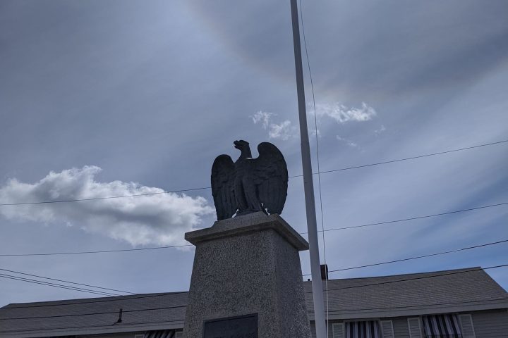 a group of people in front of a building