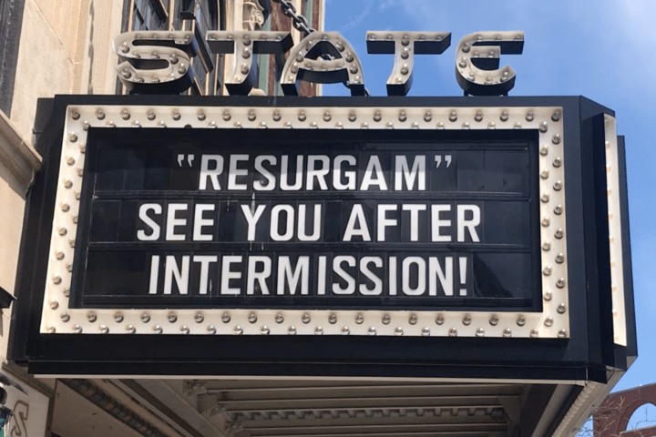 a sign on the side of a building