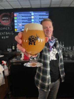 a man holding a glass of wine