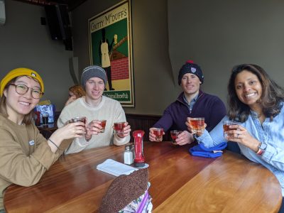a group of people sitting at a table