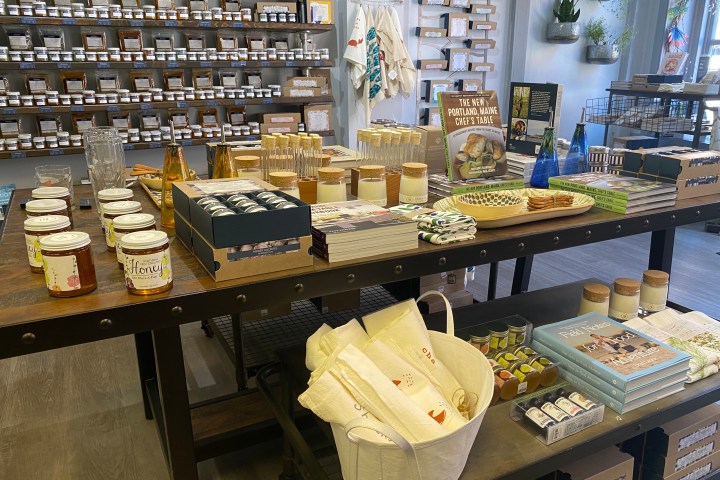 a store filled with lots of different types of food on a table