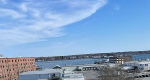 a boat sitting on top of a building