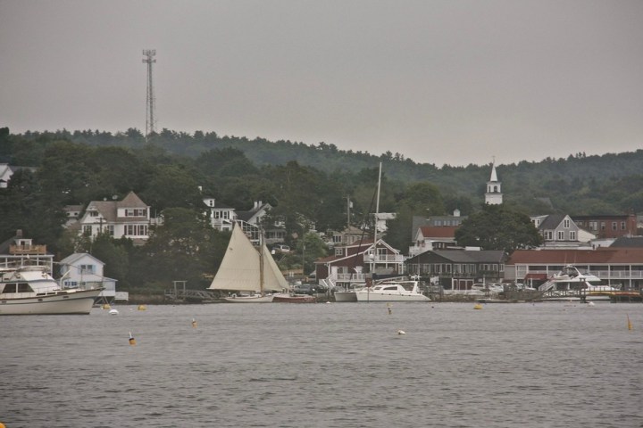a small boat in a large body of water