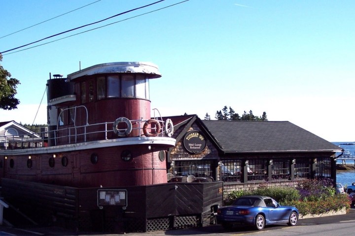 a boat parked on the side of a building