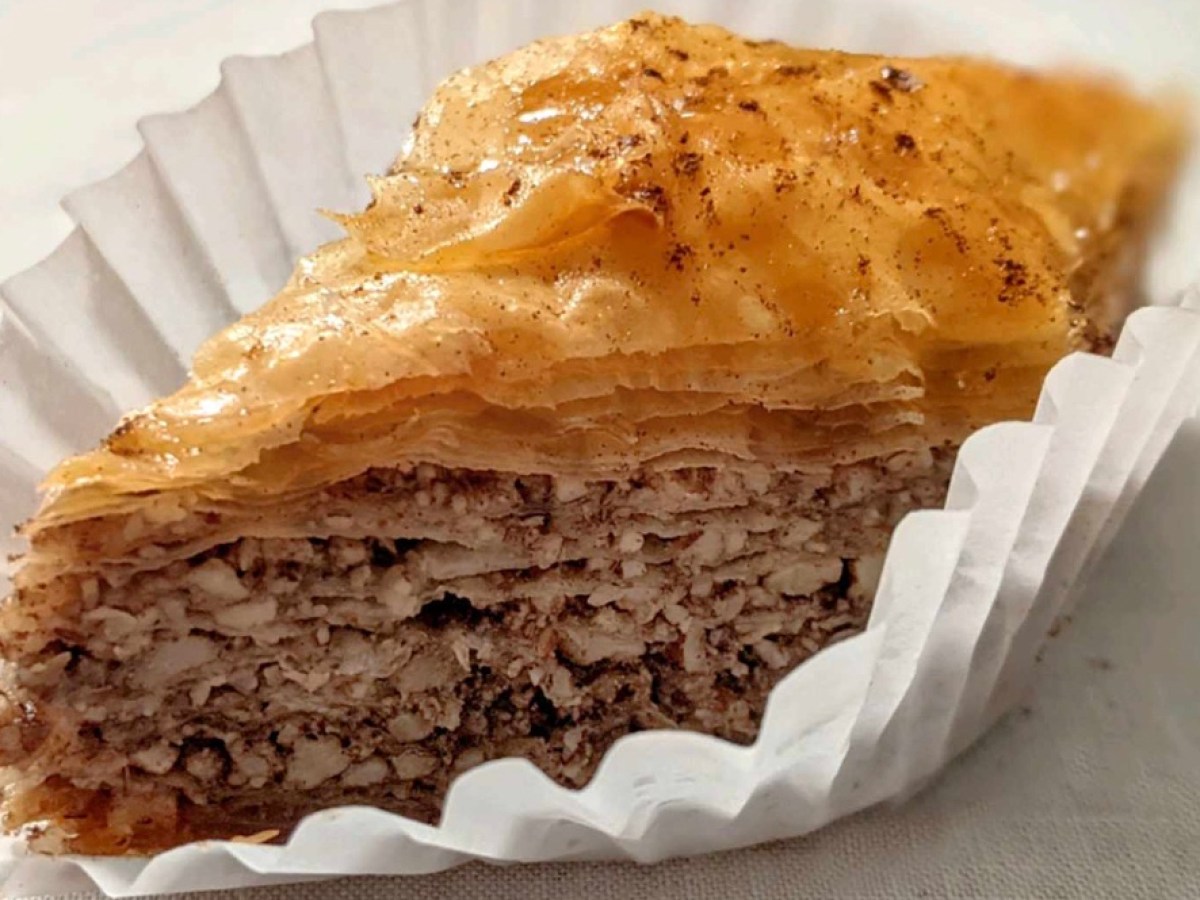 a piece of cake sitting on top of a paper plate