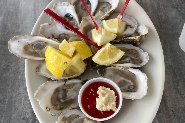 a plate of food and a cup of coffee