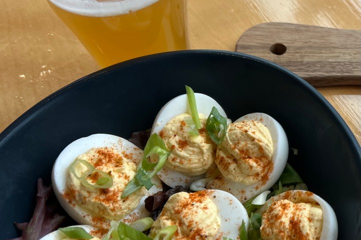 a plate of food and a cup of coffee