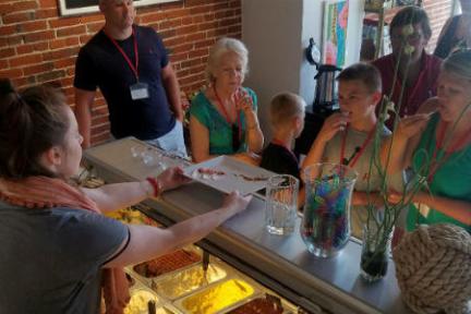 a group of people sitting at a table