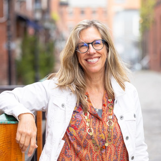 a person standing in front of a building