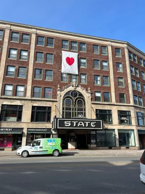 a city street in front of a building