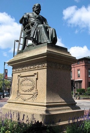 a statue in front of a building