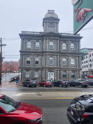 a car parked on the side of a building