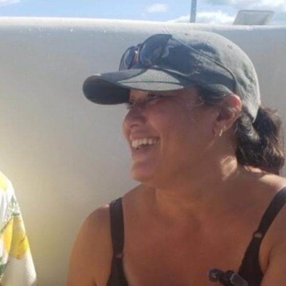 a man and a woman taking a selfie in a car