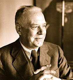Wallace Stevens wearing a suit and tie