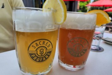 a glass of beer on a table