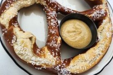 a chocolate doughnut on a plate