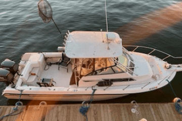 a small boat in a body of water