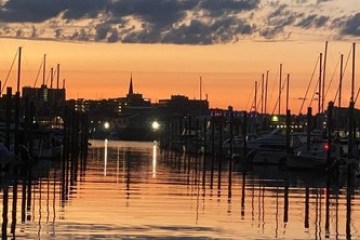 a sunset over a body of water