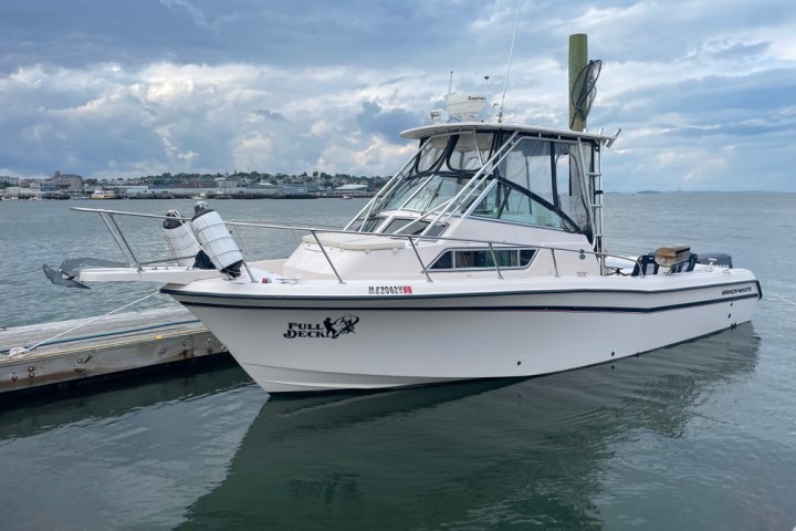 a small boat in a body of water